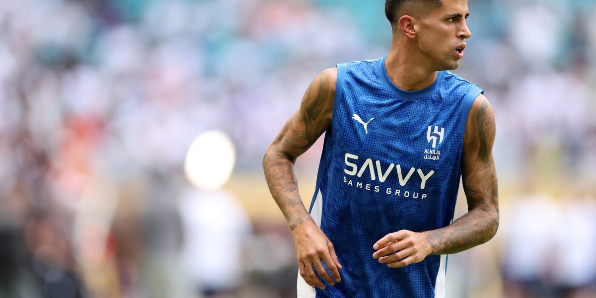 MIAMI GARDENS, FLORIDA - JUNE 18: Joao Cancelo #20 of Al Hilal warms up prior to the FIFA Club World Cup 2025 group H match between Real Madrid CF and Al Hilal at Hard Rock Stadium on June 18, 2025 in Miami Gardens, Florida. (Photo by Megan Briggs/Getty Images) (Inter links)