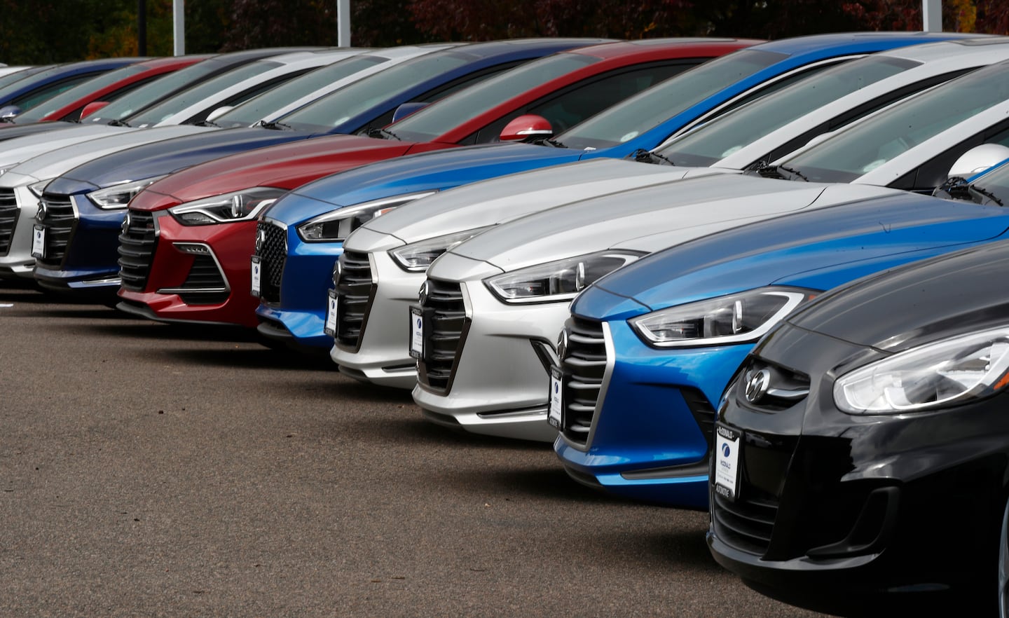 Accents, Elantras, and Sonatas sit at a Hyundai dealership in the south Denver suburb of Littleton, Colo.