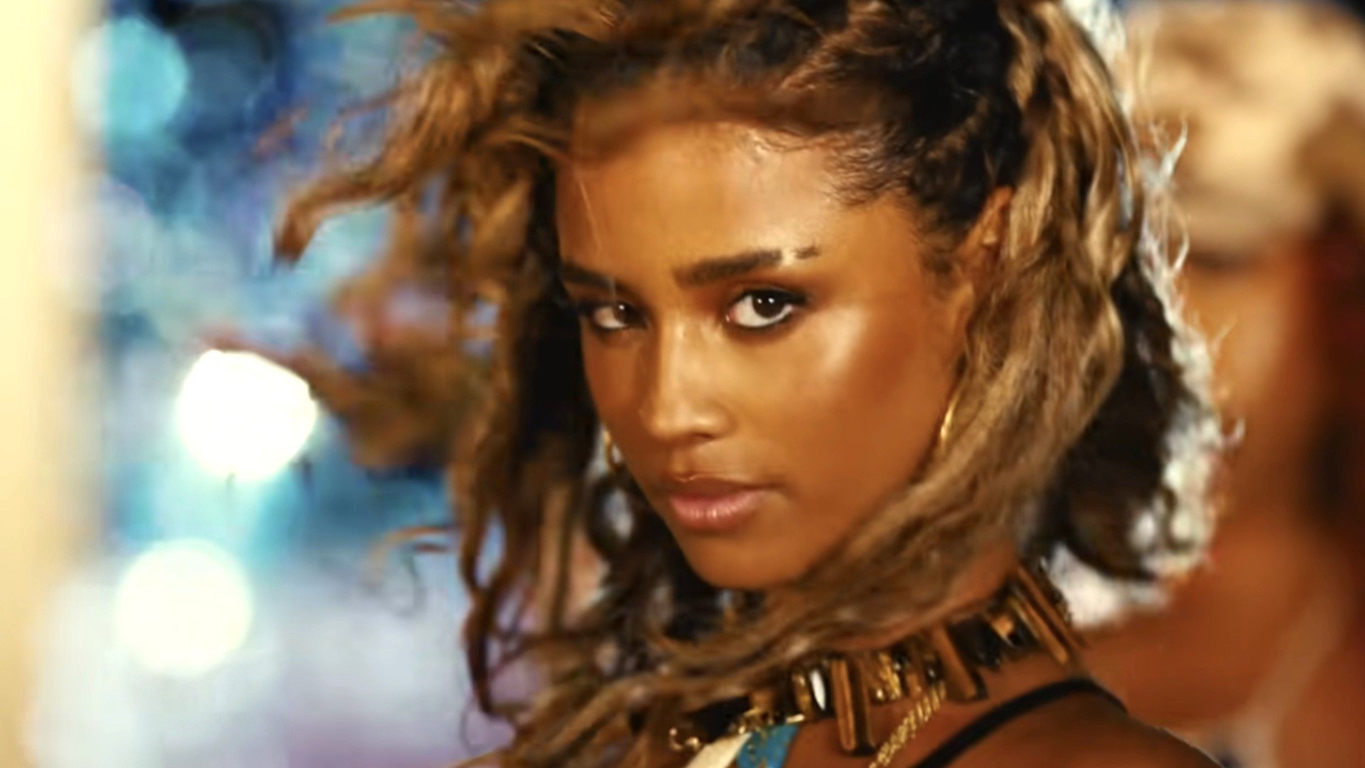 Wearing a corset dress, this South African singer reinterprets an iconic fashion symbol