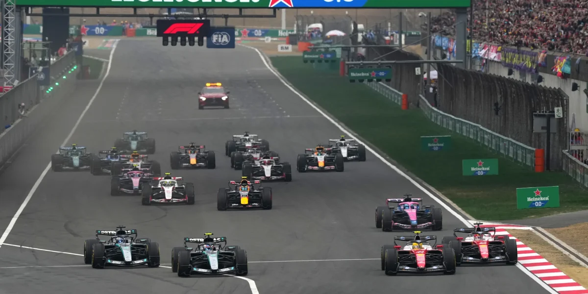 SHANGHAI, CHINA - MARCH 12: Lando Norris of Great Britain and McLaren walks in the Paddock during