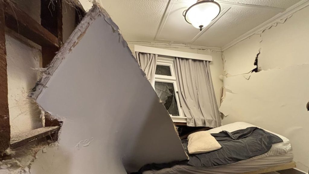 Wellington weather: Landslide crushes Wellington home while tenants sleep, caves in two bedrooms and a bathroom