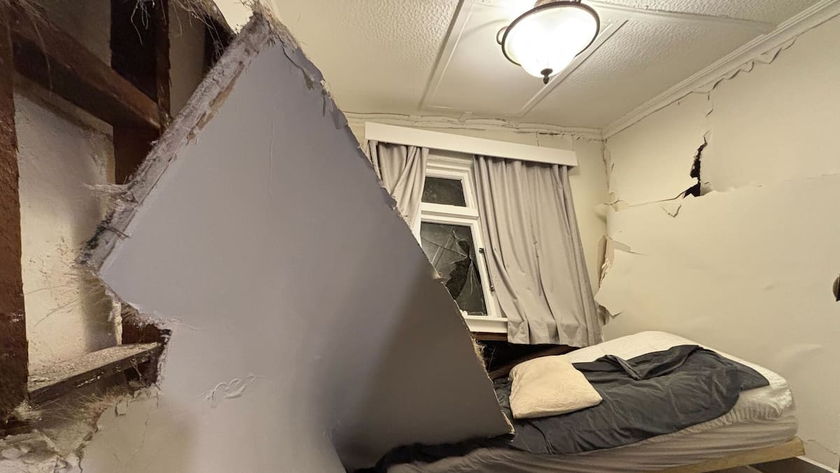 Wellington weather: Landslide crushes Wellington home while tenants sleep, caves in two bedrooms and a bathroom