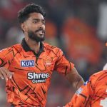 Who is Praful Hinge, who started his IPL career with a triple-wicket over?