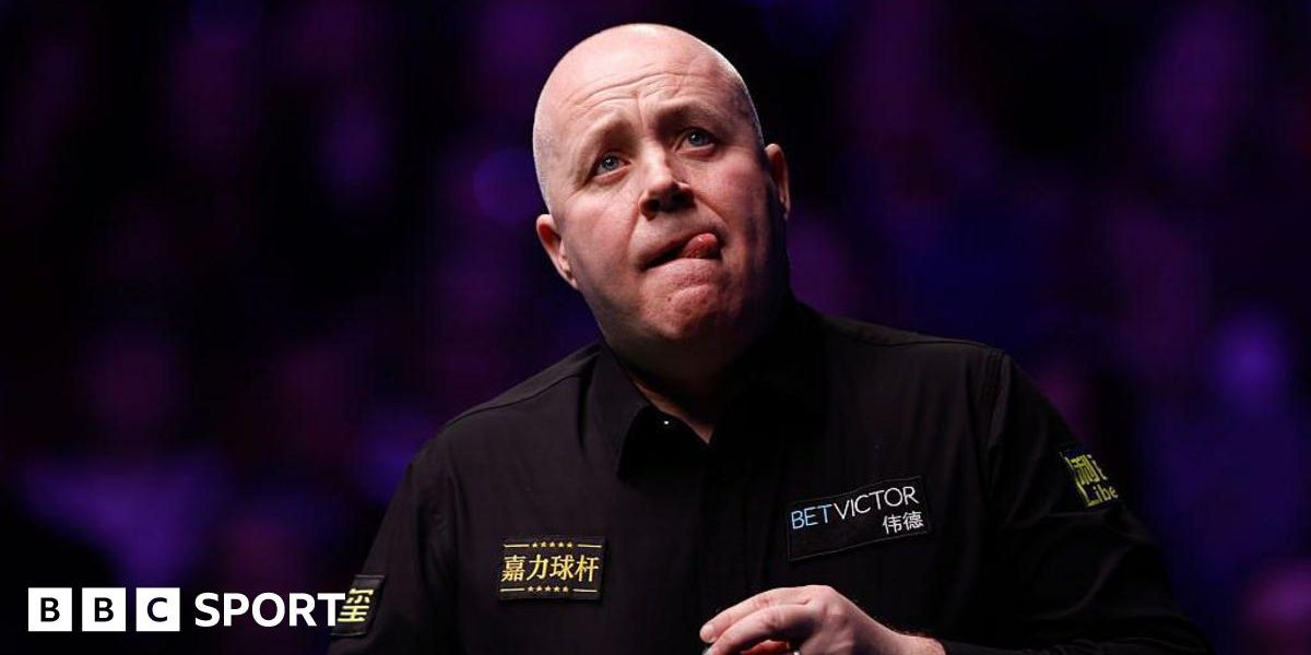 John Higgins in action at the Welsh Open