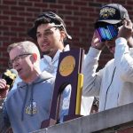 Michigan, May toast title with fans: 'This trophy is yours'