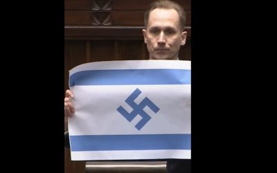 Scandal în Polonia: Deputat afișează steag israelian cu svastică în Parlament