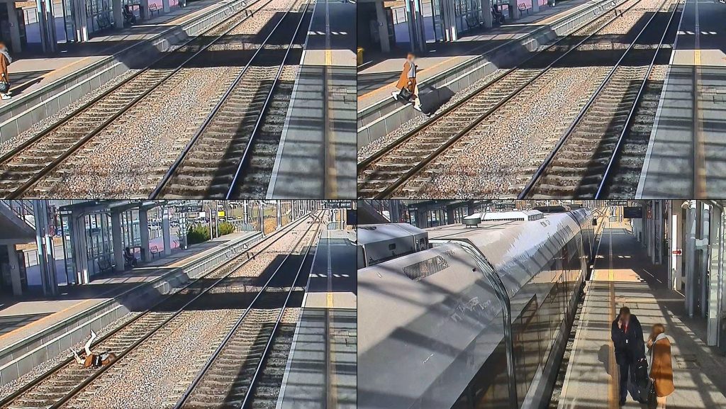 Tânără, filmată când cade pe șine în Polonia, vorbind la telefon