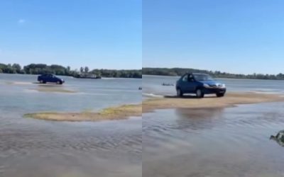 Logan în albia Dunării: Șoferul a intrat direct în șoc